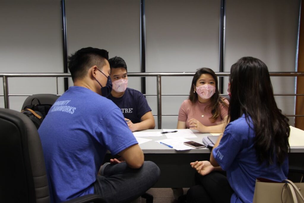 Aaron and Jerwine participating in an FSI Impact Jam workshop where Goldman Sachs Community TeamWorks volunteers consulted with entrepreneurs in FSI’s network to help them with business pitching skills.