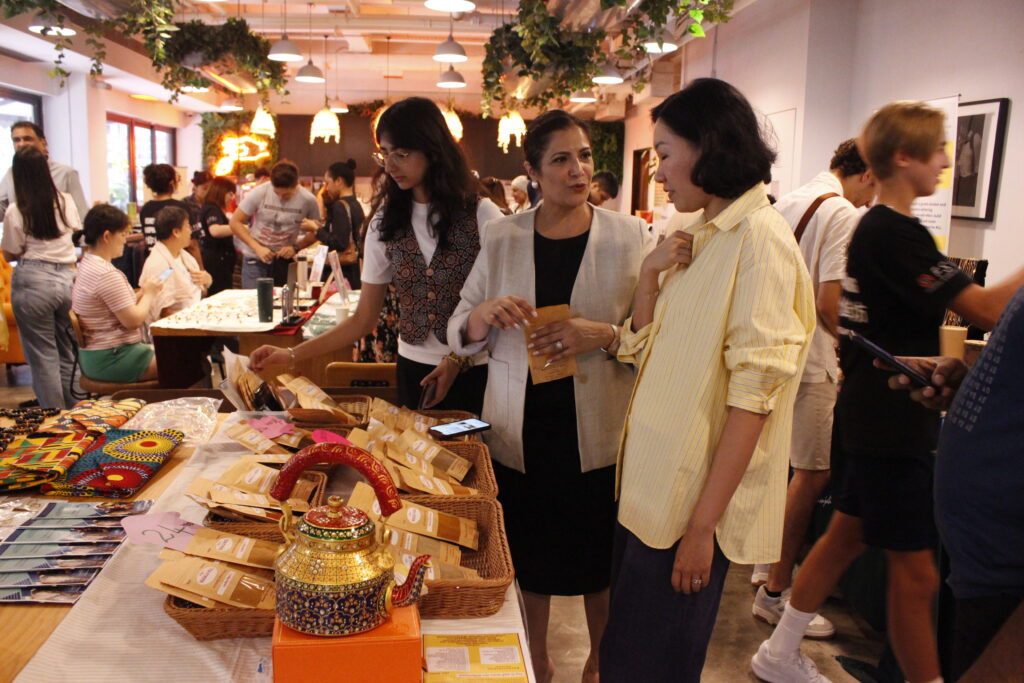 Entrepreneur Shilpa presenting her products at the GuideFong Bazaar (Community Business Support)